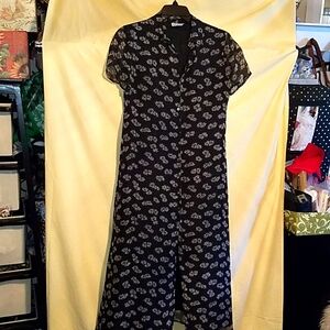 Robbie bee black silk floral maxi dress. Size 6